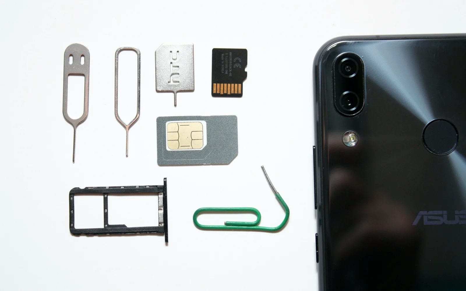 Phone, physical SIM, tray and removal tools