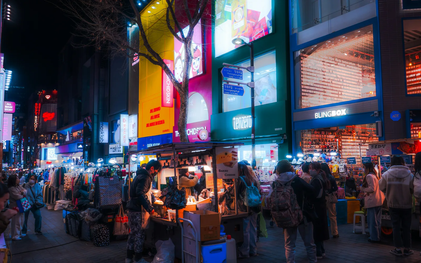 Myeongdong 8-gil street market and shop signs at night