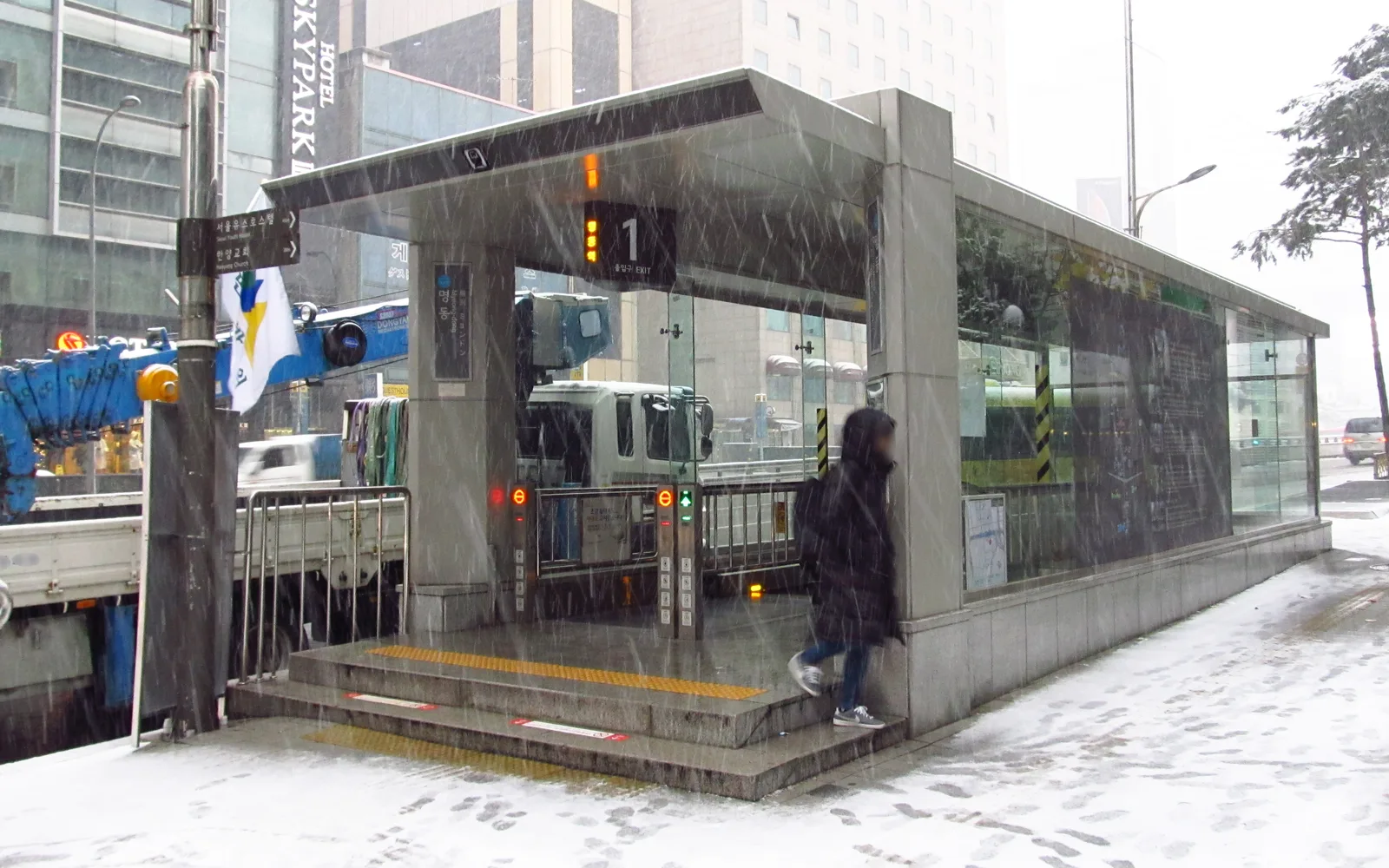 Myeongdong Station Exit 1 during snowfall