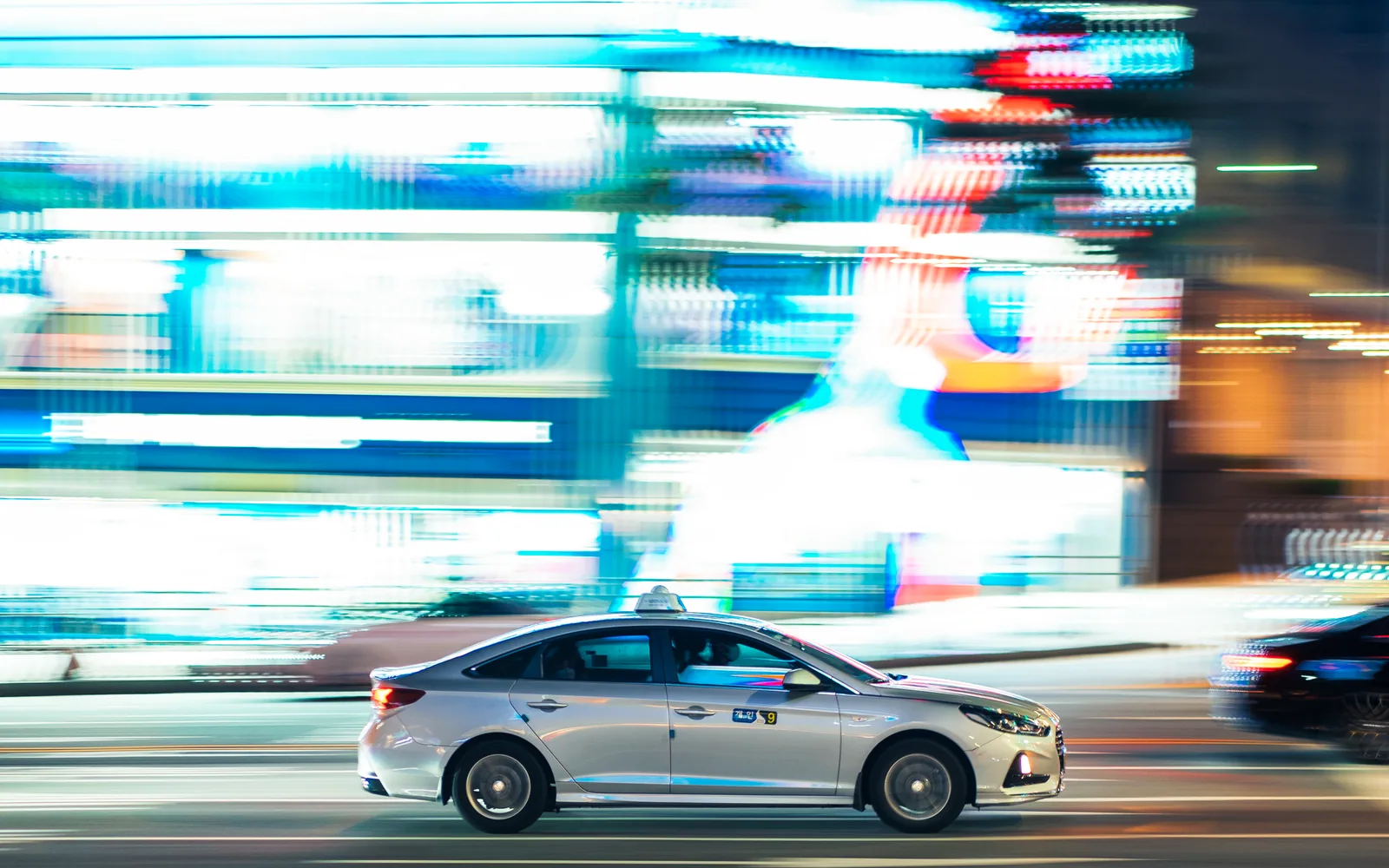 Taxi driving on a Seoul street at night