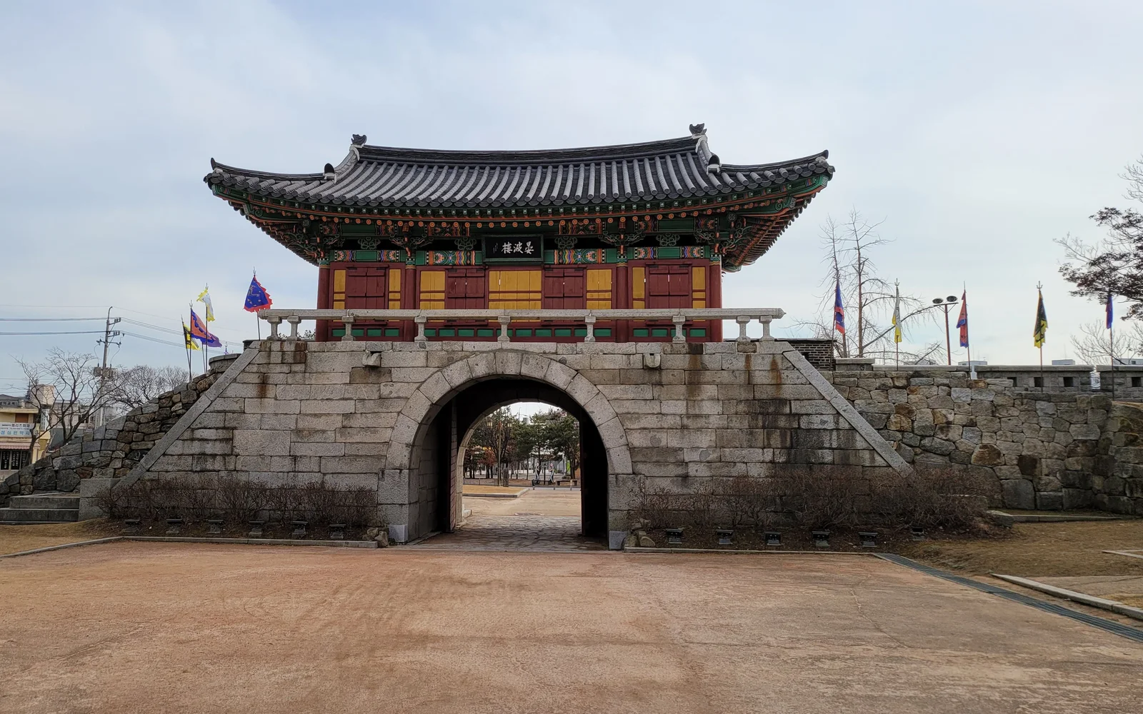 Restored South Gate of Ganghwa Fortress beneath a blue sky