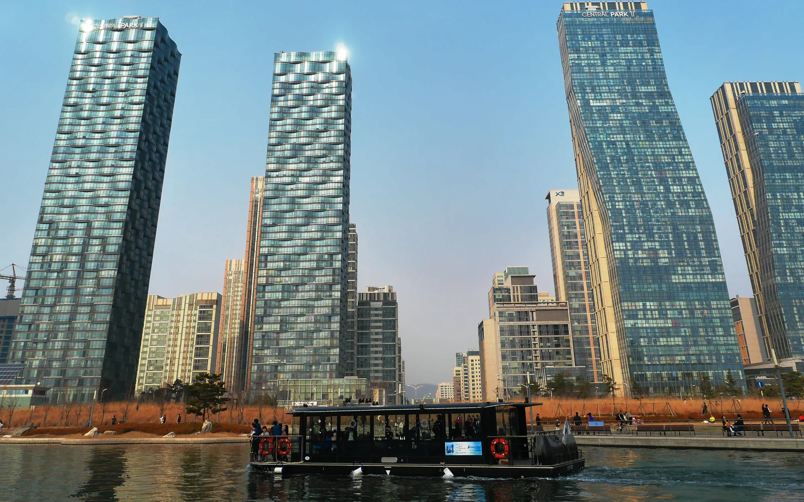 Covered passenger boat on the canal at Songdo Central Park in 2014